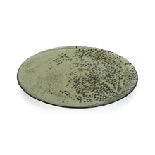 Load image into Gallery viewer, Round green glass plate with a dark green dotted textured pattern concentrated toward the edges, displayed against a white background.