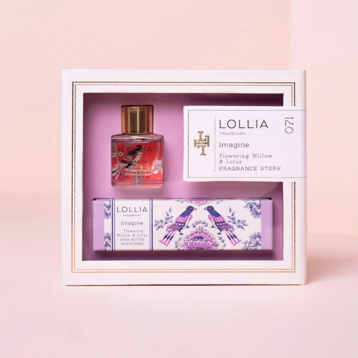 A set of LOLLIA fragrance products including a bottle of parfum and a tube of hand cream, packaged in a white  with gold box with 