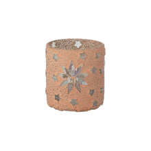 Load image into Gallery viewer, Glass mosaic votive candle holder with a pink exterior featuring small mosaic stars and a central starburst design, displayed against a white background. 