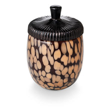Load image into Gallery viewer, Midnight Pumpkin Glass Acorn Candle, view from above of an acorn-shaped glass candle jar with irregular tan spots on a dark brown background and a glossy black ridged lid with a stem-shaped knob against a white background.