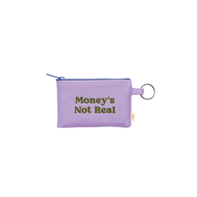 Load image into Gallery viewer, Lavender vegan leather pouch with a purple zipper and silver key ring, printed with the phrase &quot;Money&#39;s Not Real&quot; in olive green retro lettering, displayed against a white background.