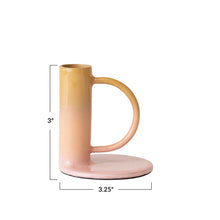 Load image into Gallery viewer, Beige and pink ceramic taper candle holder with dimensions 3&quot; x 3.25&quot; labeled on a white background.
