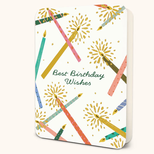 White greeting card decorated with colorful candles and gold glitter-style bursts, with green cursive text reading 