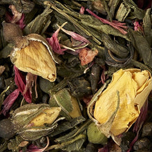 Load image into Gallery viewer, Close-up of dried tea leaves and flowers.
