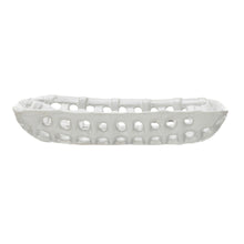 Load image into Gallery viewer, Side of a white stoneware basket with latticework pattern, against a white background.