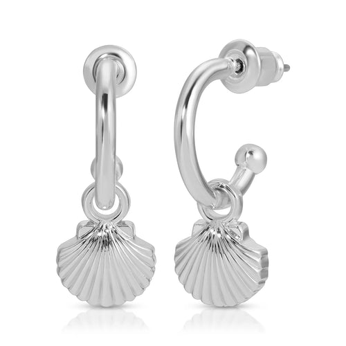 Pair of hoop earrings dipped in sterling silver featuring small dangling scallop shell charms, displayed against a white background. 