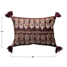 Load image into Gallery viewer, Ikat Print Lumbar Pillow, plum and cream lumbar pillow with repeating ikat print pattern, horizontal cream center stripe, burgundy tassels, and dimension graphics against white background. 