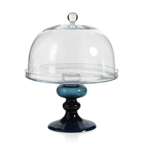 A glass cake stand with a blue base and a clear glass dome cover.