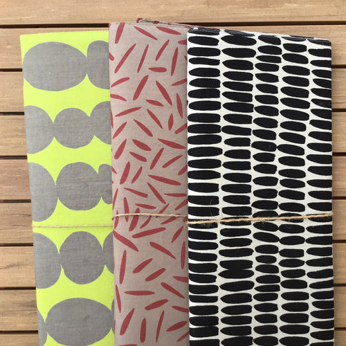 three styles patterned table runners