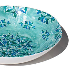 Load image into Gallery viewer, Close-up of a melamine serving bowl featuring a turquoise interior with a blue floral motif, shown on a white background. 