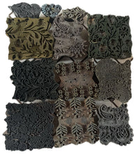 Load image into Gallery viewer, Assorted hand-carved wooden block stamps featuring traditional Mughal floral and botanical patterns used for textile printing, shown on a white background. 