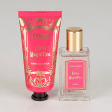 Load image into Gallery viewer, Granado Flora Magnifica perfume in a clear glass bottle with gold cap and pink and gold label beside Floral Magnifica hand cream in bright pink tube with gold botanical detailing and black cap on a white background.