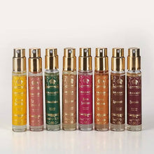 Load image into Gallery viewer, Granado travel-size perfume sprays with gold spray tops in assorted scents including Carioca, Citrus Brasilis, Époque Tropical, Amazônico, Esplendor, Rosa Sublime, Fervo Intenso, Apotecário, and Boemia on a white background.