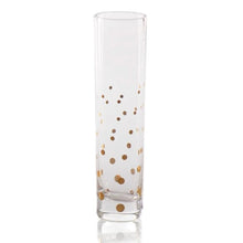 Load image into Gallery viewer, Clear glass champagne flute with scattered gold polka dot decals displayed on a white background. 