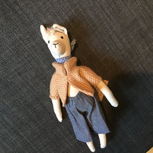 Load image into Gallery viewer, Toy llama wearing a sweater and pants on a dark textured surface