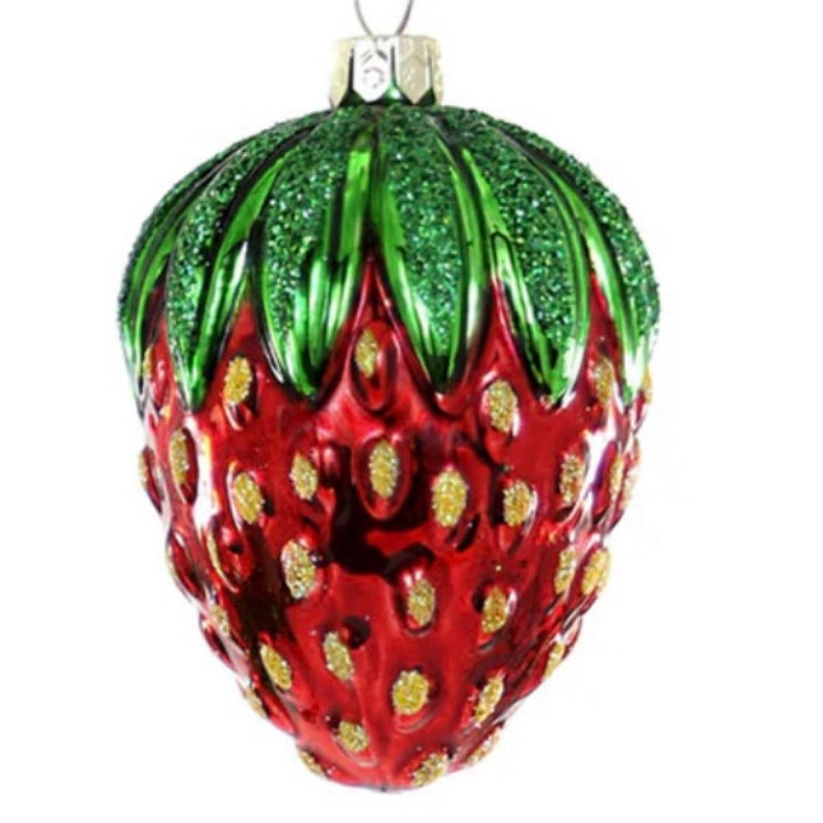 A red glass strawberry ornament with a silver cap. The strawberry top is glittery green, and the seeds are glittery yellow. On a white background.