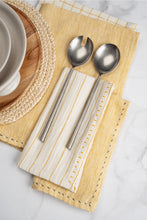Load image into Gallery viewer, Yellow linen pinstripe napkin styled with silver utensils. 