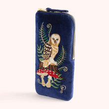 Load image into Gallery viewer, Navy blue velvet zippered sunglass pouch with an embroidered tan and brown owl perched on red mushrooms, surrounded by green ferns. On a white background.