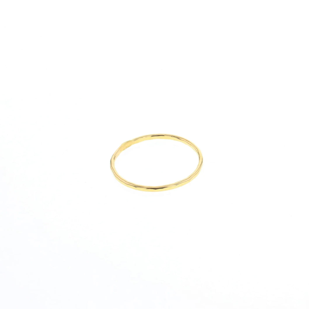 14K gold-filled stacking ring with a soft hammered finish, displayed on a white background. 