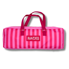 Load image into Gallery viewer, Pink and red striped Mahjong carrying bag with dark pink top handles and a rectangular patch reading "RACKS," displayed on a white background. 
