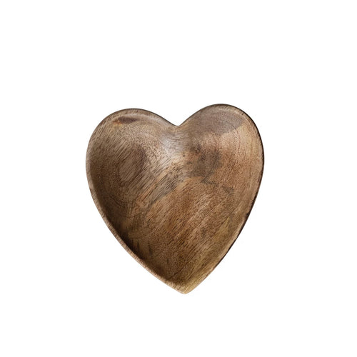 A heart-shaped mango wood tray with a natural wood grain finish, against a white background.