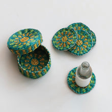 Load image into Gallery viewer, Woven coasters set  with a bottle on a white background.
