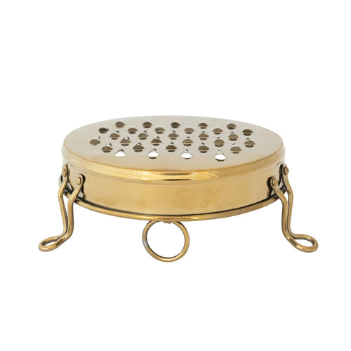 A round stainless steel footed grater with a gold finish on a white background. 