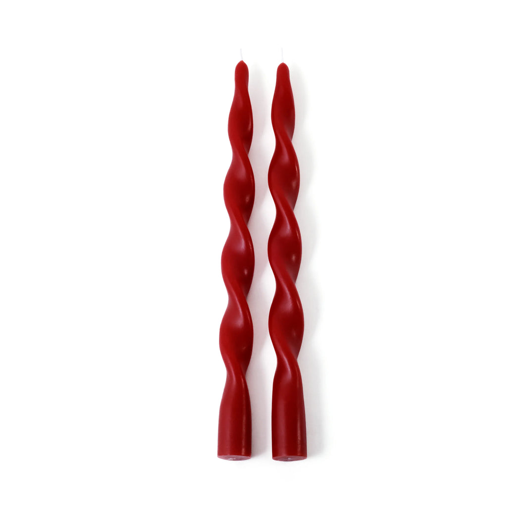 Set of two 12-inch crimson red twist candles against a white background.  