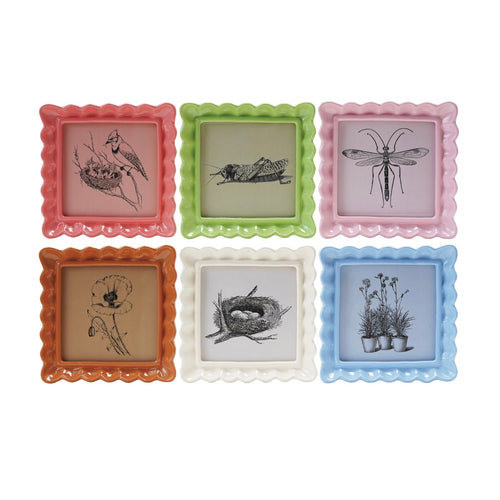 Set of six small framed pictures with different animals and nature scenes on a white background.
