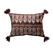Load image into Gallery viewer, Ikat Print Lumbar Pillow, burgundy and cream lumbar pillow with repeating ikat print pattern, horizontal cream center stripe, and burgundy tassels against white background.