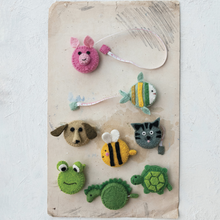 Load image into Gallery viewer, Collection of different  animal felt measuring tapes on white background.