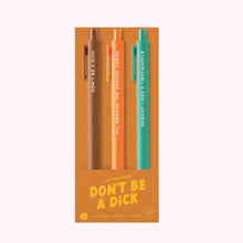 Load image into Gallery viewer, Set of three &quot;Don&#39;t Be A Dick&quot; Jotter gel pens in brown, orange, and teal packaged in an orange sleeve with yellow text, displayed against a white background.