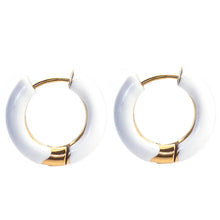 Load image into Gallery viewer, Pair of white hoop earrings with gold accents on a white background