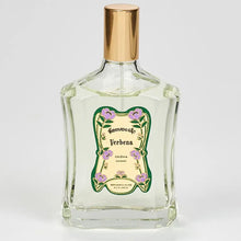 Load image into Gallery viewer, Granado Verbena cologne in clear glass bottle with gold cap and decorative label featuring purple flowers against a white background.