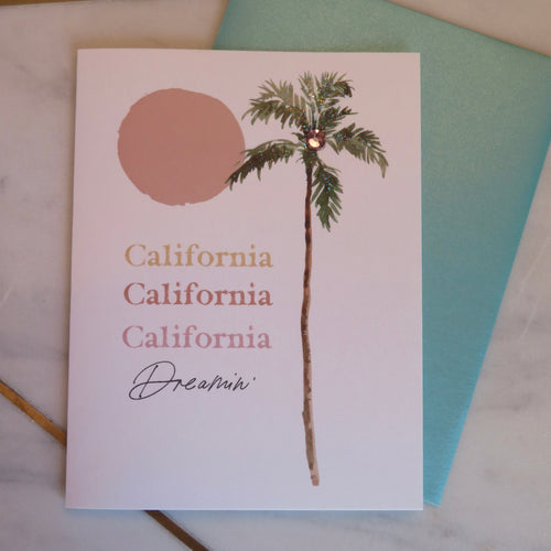 Card with palm tree and a sun , 