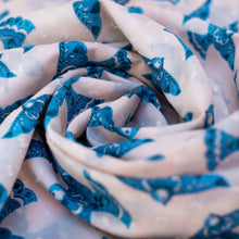 Load image into Gallery viewer, Watercolor Birds Infinity Scarf, close-up of loosely gathered white cotton fabric with blue Scandinavian-style bird pattern.
