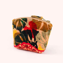 Load image into Gallery viewer, Exotic Leaves velvet mini pouch featuring bold red, green, and brown tropical leaf pattern, top zipper with gold-tone hardware and matching fabric pull, displayed on a white background.