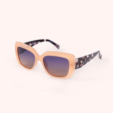 Load image into Gallery viewer, Esmeray Tan Tortoiseshell Sunglasses, oversized angular polycarbonate frames with soft peach front and tortoiseshell-patterned  arms, dark gradient lenses, angled side view against a white background. 