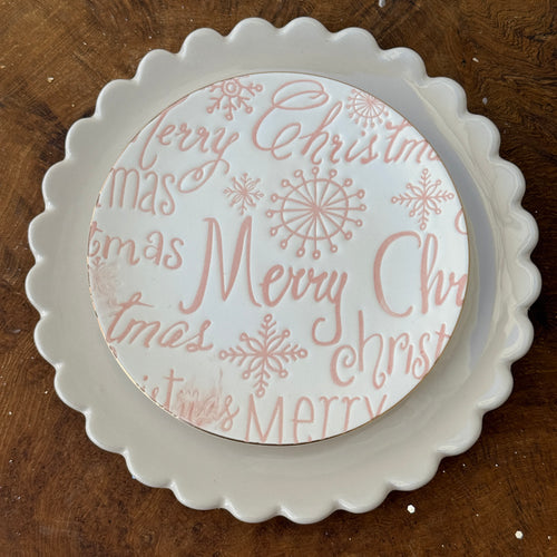 A white round stoneware plate with 