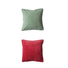 Load image into Gallery viewer, Two square solid-color velvet pillows displayed on a white background, one in soft green and the other in deep red.