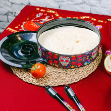 Load image into Gallery viewer, Day of the Dead Tortilla Holder, melamine round black tortilla warmer with aqua sugar skull and colorful floral design, black lid beside holder, tortillas inside , and matching black tongs displayed on red surface. 