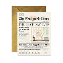 Load image into Gallery viewer, Newlywed Times Card,  newspaper style wedding greeting card with black text headlines, illustrated tiered wedding cake, wine bottles, pastel streamers, weather forecast, and glittery gold envelope against white background. 