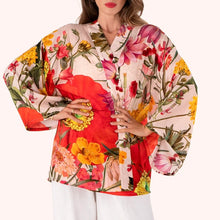Load image into Gallery viewer, Cream Fine Flowers Kimono Jacket, lightweight kimono-style jacket with orange, pink, and yellow floral print and wide sleeves, worn by model, against white background. 