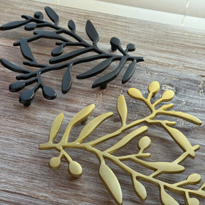 Metal Trivet Branch available at Bench Home