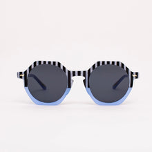 Load image into Gallery viewer, Pool Boy Blues Sunglasses, oversized hexagon sunglasses with black-and-white striped top frames and bridge, light blue lower frames, and dark tinted lenses with 100% UV protection, against white background.
