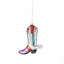 Load image into Gallery viewer, Hand-painted Cowboy Boot Ornament,  glass cowboy boot with a purple toe, light turquoise shaft with red-and-white  decorative detailing, red trim, clear rhinestone accents, a silver-tone spur, and a gold hanging cord against a white background. 