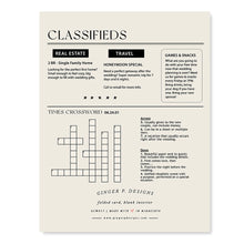 Load image into Gallery viewer, Newlywed Times Card, back of white newspaper-style card with black classifieds layout, crossword puzzle design, and printed brand details against white background.