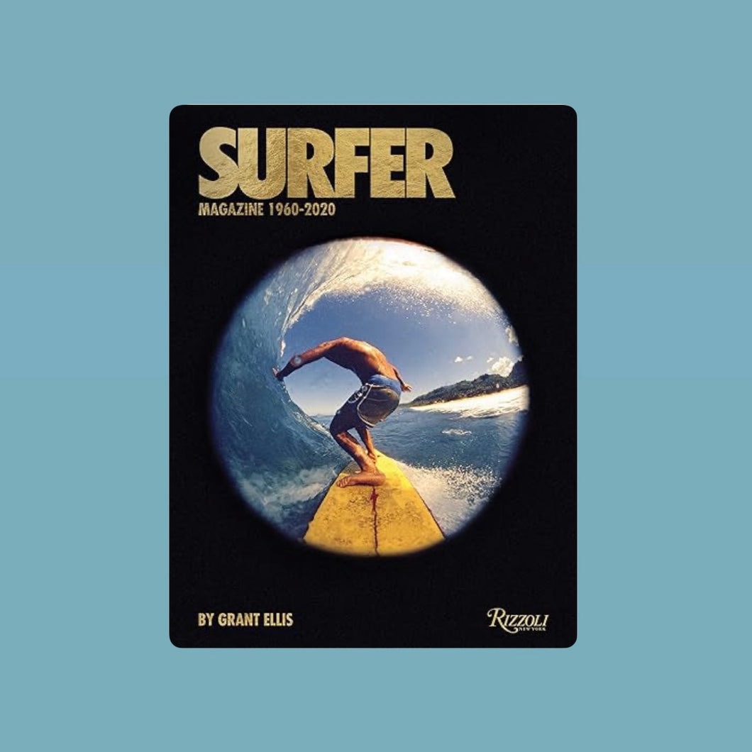 Book cover of Surfer: Magazine 1960-2020 by Grant Ellis featuring a fisheye view of a surfer riding inside a blue wave while standing on a yellow surfboard, with sunlight glinting off the water.  Book displayed against a blue background.