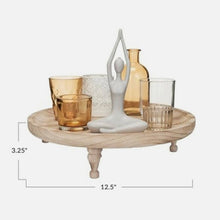 Load image into Gallery viewer, Footed Tray With Votive Holders, Vase &amp; Yoga Figure Set, round wood footed tray with assorted glass holders, amber vase, seated white metal yoga figure, and measurement graphic against white background. 