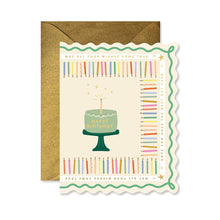 Load image into Gallery viewer, Birthday Cake and Candles Scallop Card, cream rectangular greeting card with scalloped edges, illustrated sage green birthday cake on dark green pedestal stand, colorful candle border, green wavy trim, gold foiled accents, and glittery gold envelope, displayed on white background. 